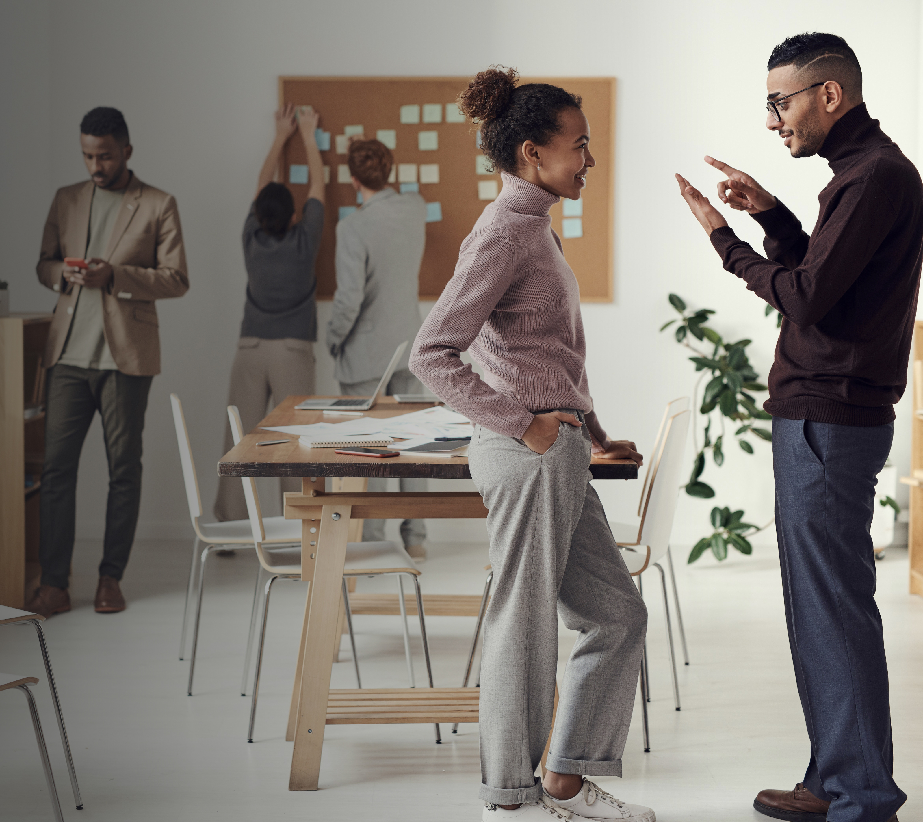 Professionals in conversation at work